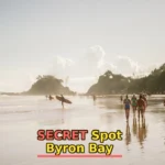 people walking along beach during daytime