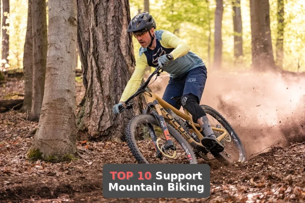 a man riding a mountain bike through a forest