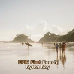 people walking along beach during daytime