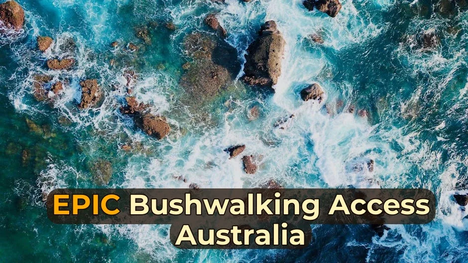 Stunning aerial view of ocean waves crashing against rocks, creating a beautiful natural pattern.