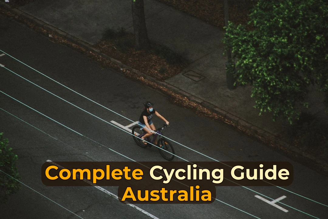 man in black t-shirt riding bicycle on road during daytime