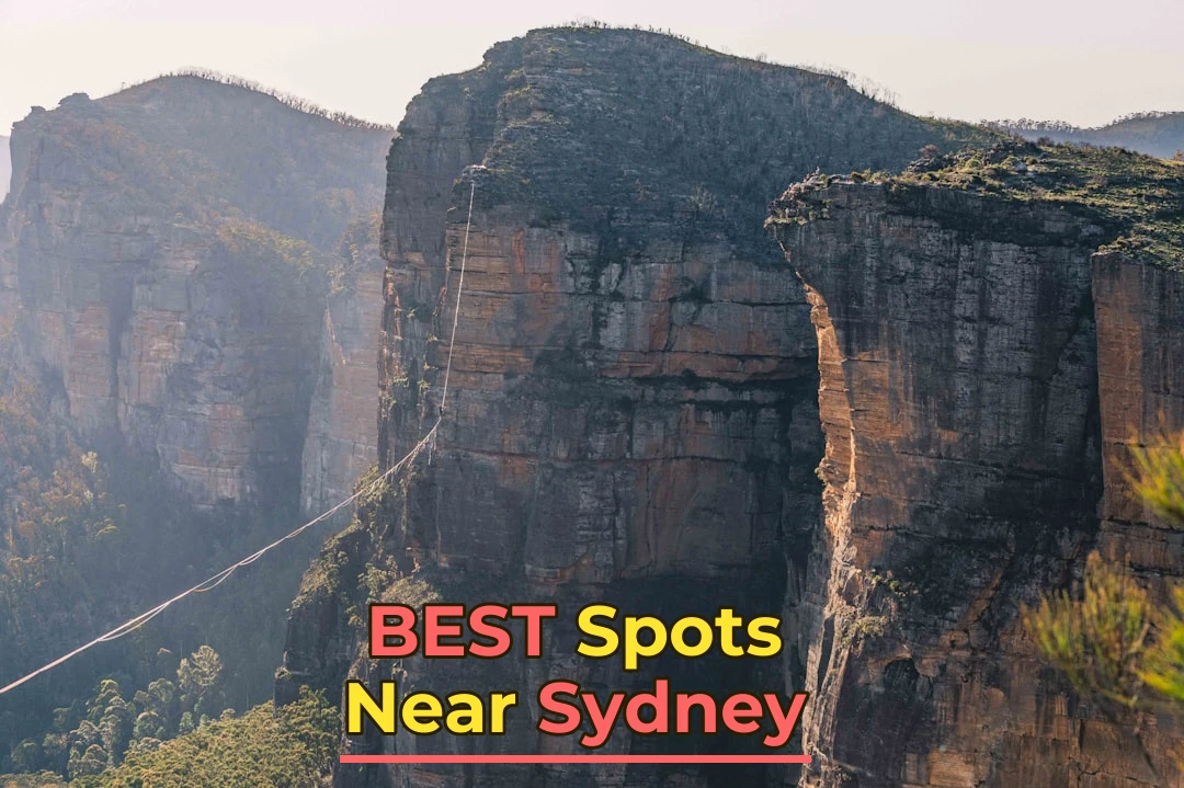 a rope bridge suspended between two rocky mountains