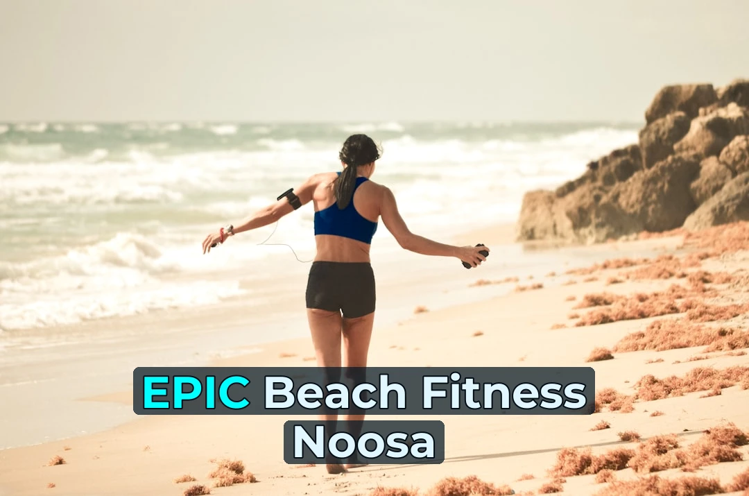 woman walking on sand near seashore during daytime